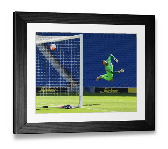 Framed Print : Pepe Scores in Empty Stadium: Arsenal Wins Against Brighton Amidst Pandemic-Enforced Silence