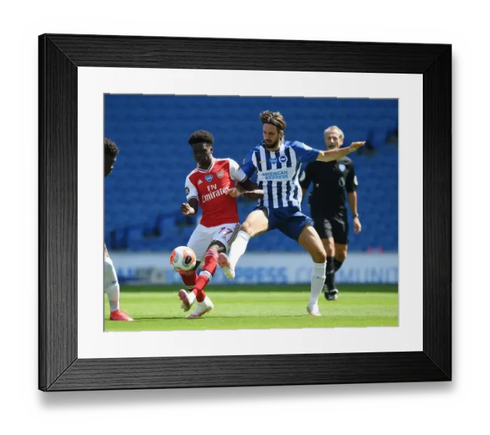 Framed Print : Bukayo Saka vs. Propper: Empty Stadium Showdown - Brighton vs. Arsenal Amidst the Pandemic Framed Print : Bukayo Saka vs. Propper: Empty Stadium Showdown - Brighton vs. Arsenal Amidst the Pandemic