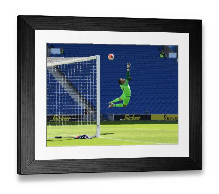 Framed Print : Arsenal's Nicolas Pepe Scores Past Brighton's Mat Ryan in Empty Premier League Match