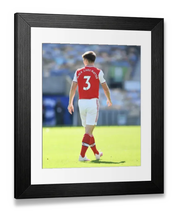 Framed Print : Arsenal's Kieran Tierney in Empty American Express Community Stadium: Brighton vs Arsenal, Premier League 2019-2020