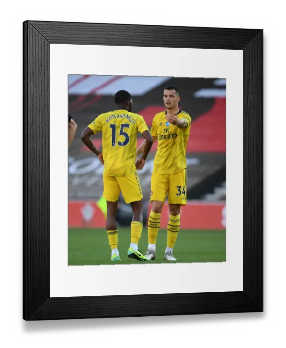 Framed Print : Arsenal's Maitland-Niles and Xhaka in Action: Southampton vs Arsenal (2019-20) Framed Print : Arsenal's Maitland-Niles and Xhaka in Action: Southampton vs Arsenal (2019-20)
