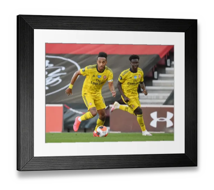 Framed Print : Arsenal's Aubameyang and Saka in Action against Southampton (2019-20) Framed Print : Arsenal's Aubameyang and Saka in Action against Southampton (2019-20)