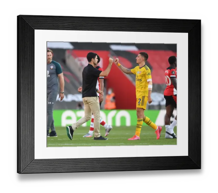 Framed Print : Arsenal's Mikel Arteta and Hector Bellerin Celebrate Victory over Southampton in Premier League