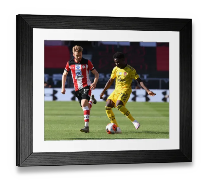 Framed Print : Saka vs. Armstrong: A Premier League Showdown at Southampton (2019-20)