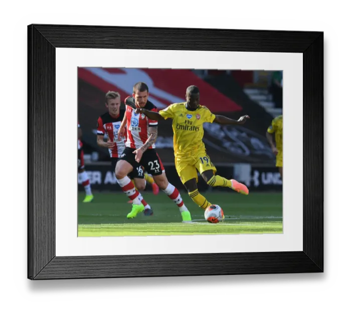 Framed Print : Pepe vs. Hojbjerg: Intense Clash Between Southampton and Arsenal in Premier League Framed Print : Pepe vs. Hojbjerg: Intense Clash Between Southampton and Arsenal in Premier League