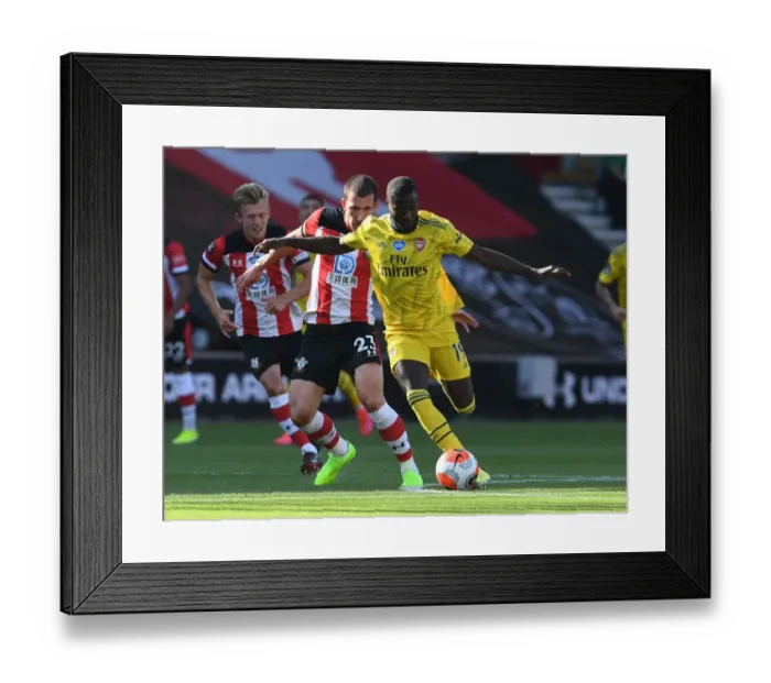 Framed Print : Pepe vs. Hojbjerg: A Premier League Showdown at St. Mary's Stadium