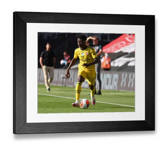 Framed Print : Bukayo Saka in Action: Arsenal's Star Performance Against Southampton, Premier League 2019-2020