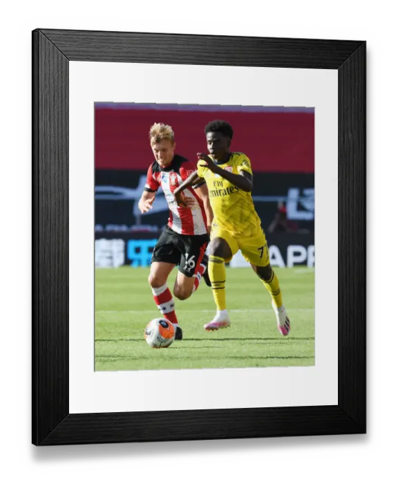 Framed Print : Saka vs Ward-Prowse: A Premier League Battle at St. Mary's Stadium Framed Print : Saka vs Ward-Prowse: A Premier League Battle at St. Mary's Stadium