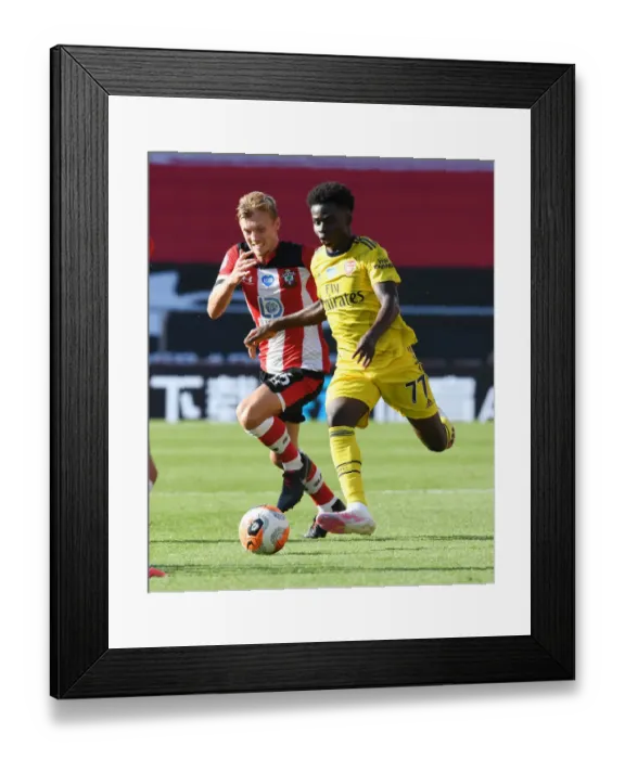Framed Print : Saka vs Ward-Prowse: A Premier League Showdown at St. Mary's - Southampton vs Arsenal (2019-2020) Framed Print : Saka vs Ward-Prowse: A Premier League Showdown at St. Mary's - Southampton vs Arsenal (2019-2020)