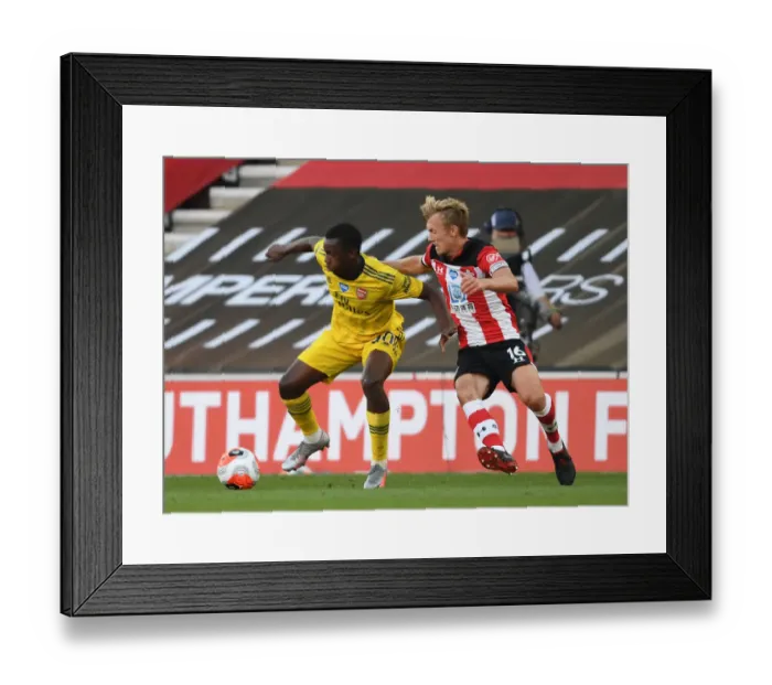 Framed Print : Arsenal's Eddie Nketiah Fends Off Southampton's James Ward-Prowse in Intense Premier League Clash (Southampton v Arsenal 2019-20) Framed Print : Arsenal's Eddie Nketiah Fends Off Southampton's James Ward-Prowse in Intense Premier League Clash (Southampton v Arsenal 2019-20)