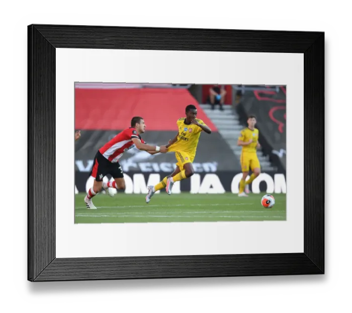 Framed Print : Arsenal's Eddie Nketiah Faces Off Against Southampton's Jan Bednarek in Premier League Clash Framed Print : Arsenal's Eddie Nketiah Faces Off Against Southampton's Jan Bednarek in Premier League Clash
