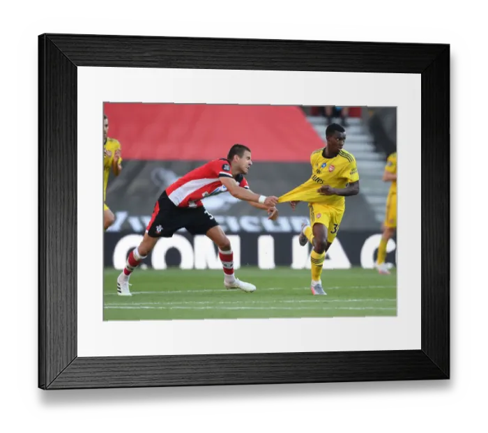 Framed Print : Intense Face-Off: Nketiah vs Bednarek in Southampton's Premier League Showdown Framed Print : Intense Face-Off: Nketiah vs Bednarek in Southampton's Premier League Showdown