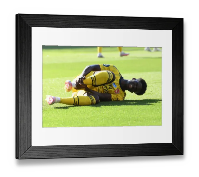 Framed Print : Bukayo Saka Suffers Injury in Arsenal's Southampton Clash (2019-20)