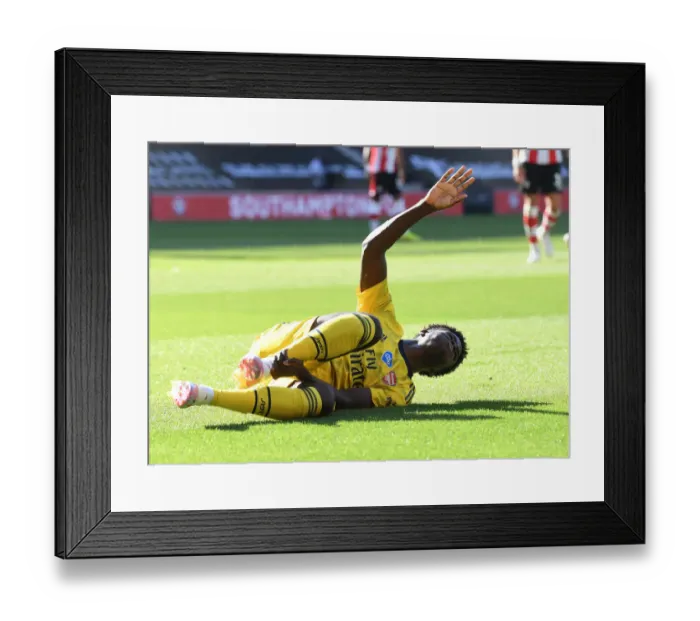Framed Print : Arsenal's Bukayo Saka Suffers Injury in Southampton Clash (2019-20)