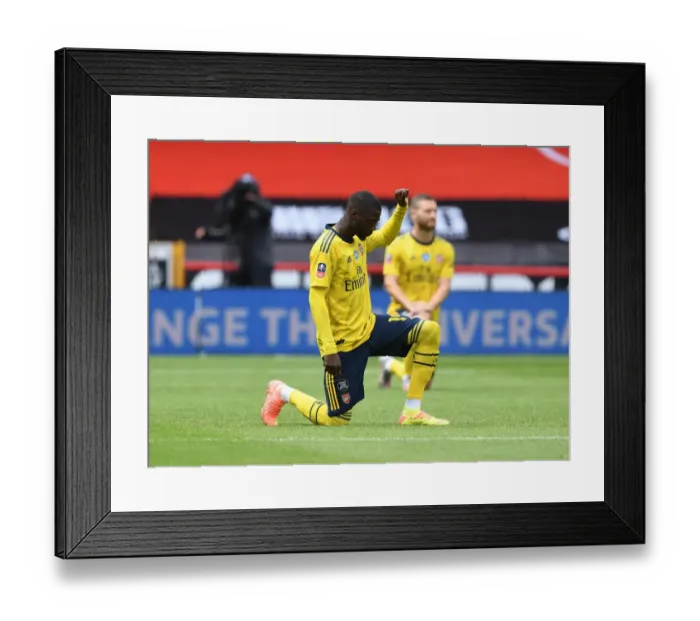 Framed Print : Arsenal's Nicolas Pepe Takes a Knee before Sheffield United FA Cup Quarterfinal