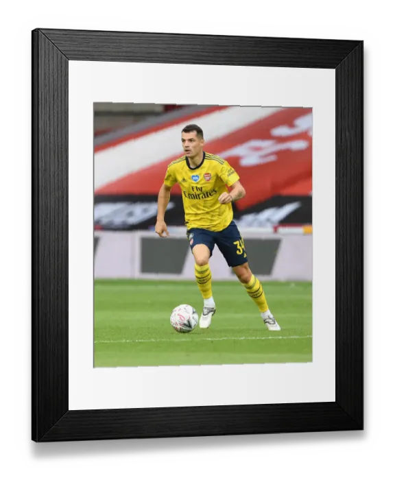Framed Print : Granit Xhaka in Action: Arsenal's FA Cup Battle against Sheffield United Framed Print : Granit Xhaka in Action: Arsenal's FA Cup Battle against Sheffield United