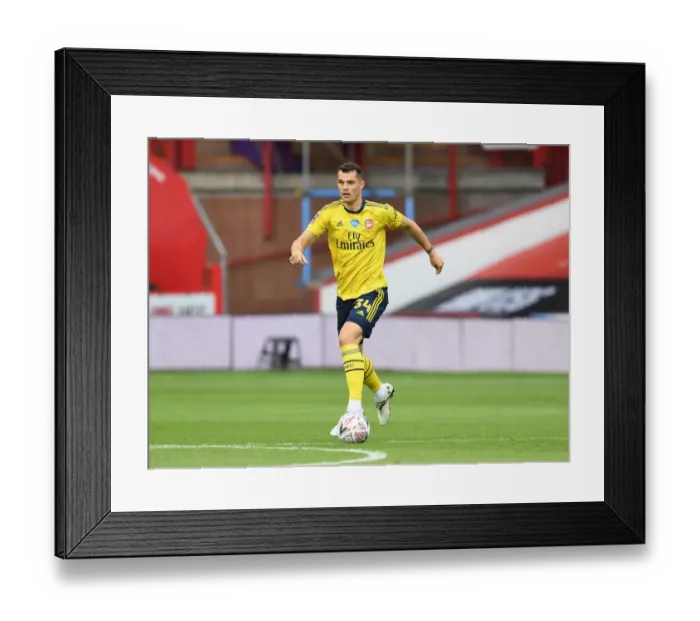 Framed Print : Granit Xhaka in Action: Arsenal vs. Sheffield United - FA Cup Quarterfinals Framed Print : Granit Xhaka in Action: Arsenal vs. Sheffield United - FA Cup Quarterfinals