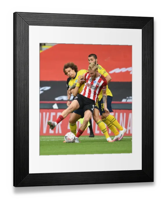 Framed Print : David Luiz vs Olivier McBurnie: Clash in the FA Cup Quarterfinals - Sheffield United vs Arsenal