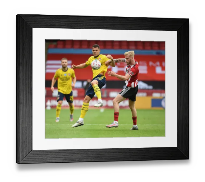 Framed Print : Xhaka vs McBurnie: FA Cup Battle - Sheffield United vs Arsenal Framed Print : Xhaka vs McBurnie: FA Cup Battle - Sheffield United vs Arsenal