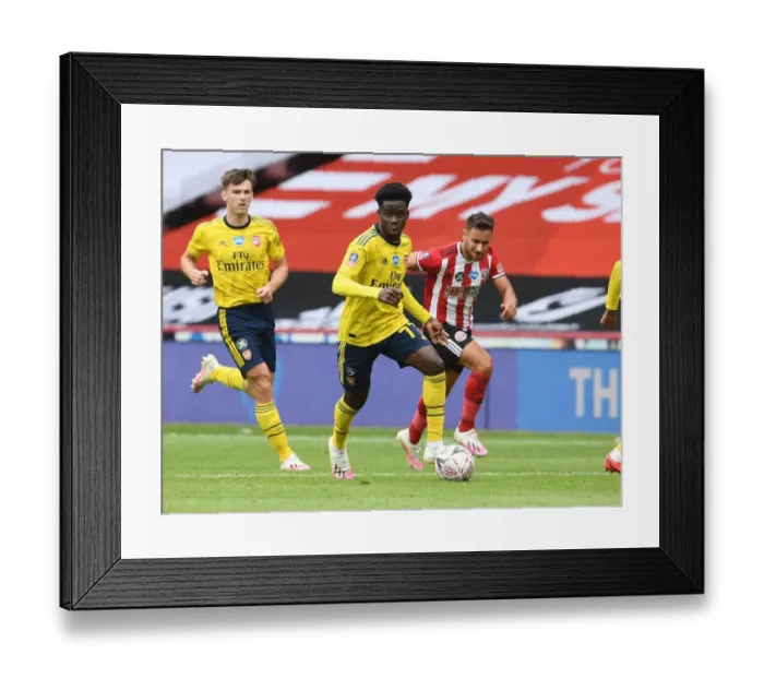 Framed Print : Arsenal's Bukayo Saka in FA Cup Quarterfinal Action Against Sheffield United