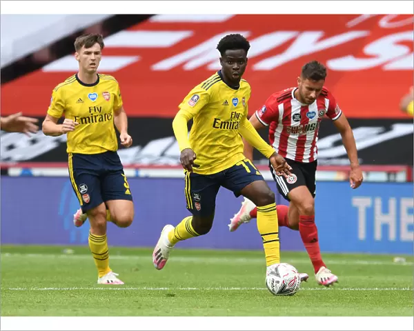 Bukayo Saka in Action: Arsenal's FA Cup Battle against Sheffield United