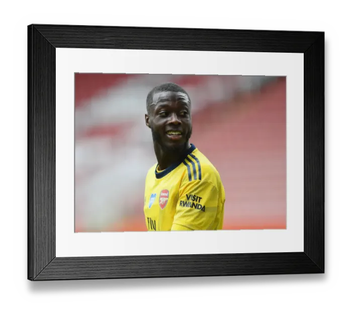 Framed Print : Arsenal's Nicolas Pepe in FA Cup Quarterfinal Action Against Sheffield United