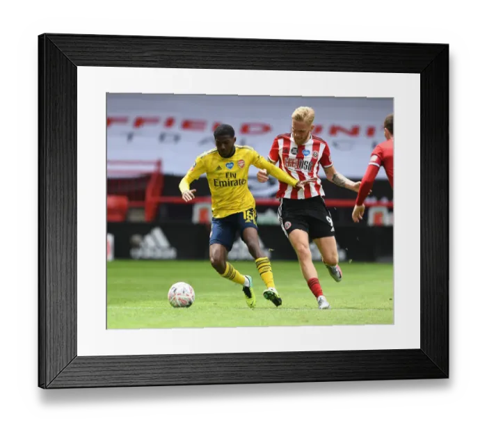 Framed Print : Arsenal in Action against Sheffield United in FA Cup Quarterfinal