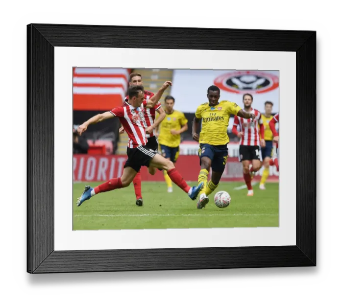 Framed Print : Nketiah vs. Egan: A FA Cup Quarterfinal Battle - Sheffield United vs. Arsenal Framed Print : Nketiah vs. Egan: A FA Cup Quarterfinal Battle - Sheffield United vs. Arsenal