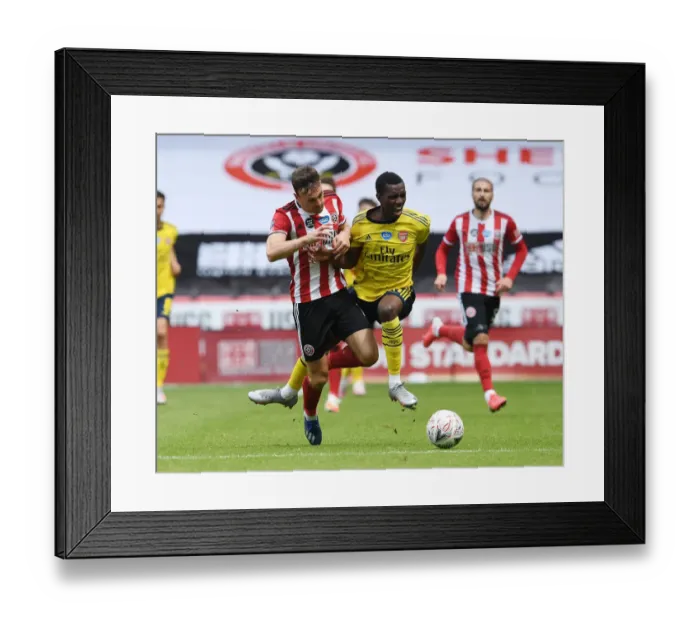 Framed Print : Arsenal vs Sheffield United: FA Cup Quarterfinal Battle - Nketiah vs Robinson