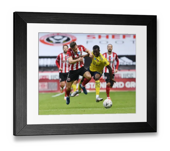 Framed Print : Nketiah vs. Egan: FA Cup Quarterfinal Showdown - Sheffield United vs. Arsenal Framed Print : Nketiah vs. Egan: FA Cup Quarterfinal Showdown - Sheffield United vs. Arsenal