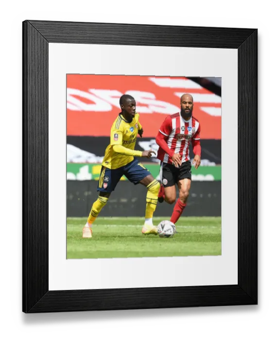 Framed Print : Nicolas Pepe's Magic Moment: Arsenal Advance to FA Cup Semis Past Sheffield United Framed Print : Nicolas Pepe's Magic Moment: Arsenal Advance to FA Cup Semis Past Sheffield United