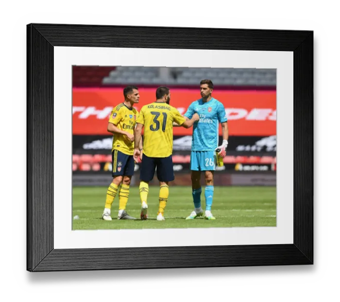 Framed Print : Arsenal's Xhaka, Kolasinac, and Martinez Celebrate FA Cup Quarterfinal Victory over Sheffield United