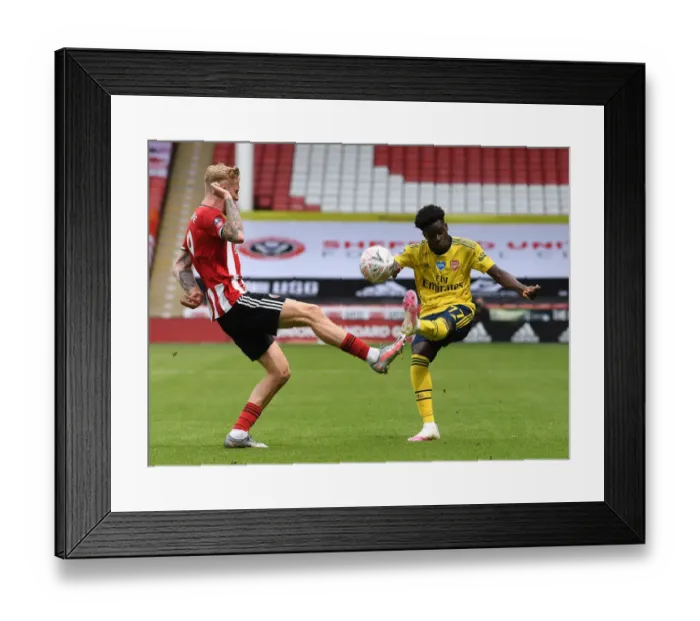 Framed Print : FA Cup Quarterfinal: Heart-stopping Moment as Olivier McBurnie Blocks Bukayo Saka's Game-Changing Cross (Sheffield United vs. Arsenal)
