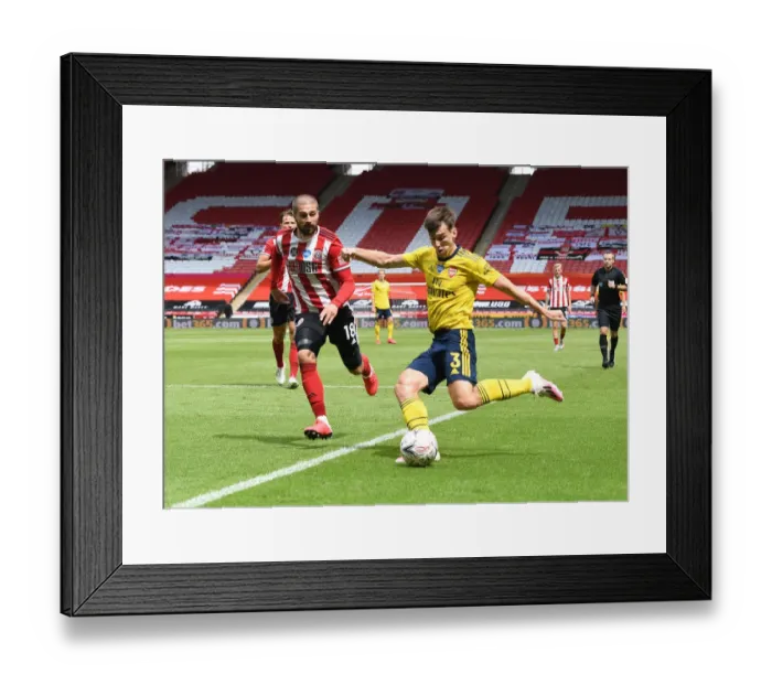 Framed Print : Arsenal's Kieran Tierney Goes Head-to-Head with Sheffield United's Kieran Freeman in FA Cup Quarterfinal Showdown
