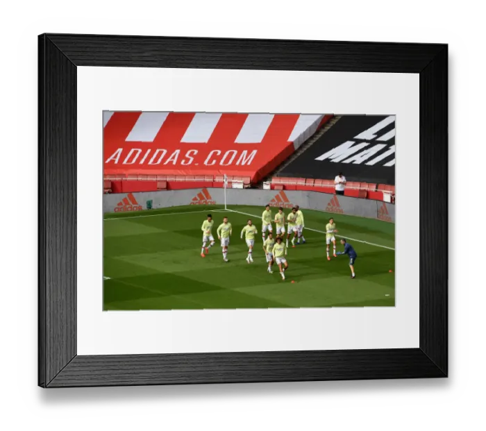 Framed Print : Arsenal Players Warm Up Ahead of Arsenal FC vs Norwich City Premier League Clash at Emirates Stadium