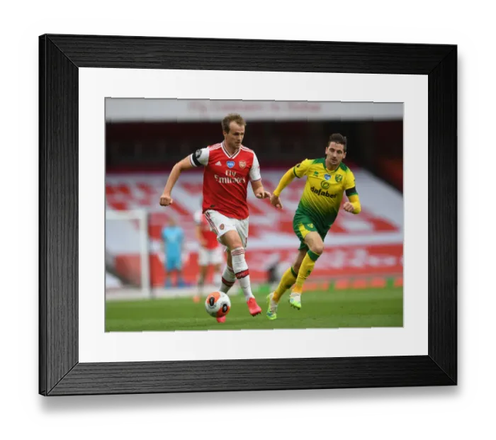 Framed Print : Arsenal vs Norwich: Holding vs McLean - Premier League Battle at Emirates Stadium Framed Print : Arsenal vs Norwich: Holding vs McLean - Premier League Battle at Emirates Stadium