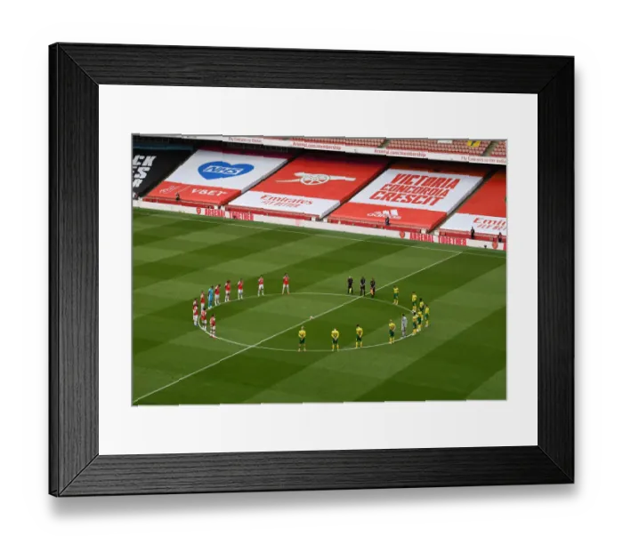 Framed Print : Arsenal and Norwich Players Honor Fallen Fans with a Minute's Silence before Premier League Match (2019-20)