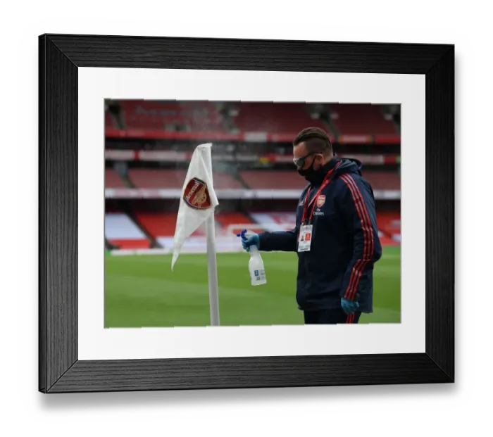 Framed Print : Arsenal vs Norwich: Disinfecting the Emirates Stadium Pitch - Premier League 2019-2020