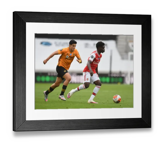 Framed Print : Bukayo Saka vs Raul Jimenez: Intense Battle at Molineux - Wolverhampton Wanderers vs Arsenal FC, Premier League 2019-2020 Framed Print : Bukayo Saka vs Raul Jimenez: Intense Battle at Molineux - Wolverhampton Wanderers vs Arsenal FC, Premier League 2019-2020