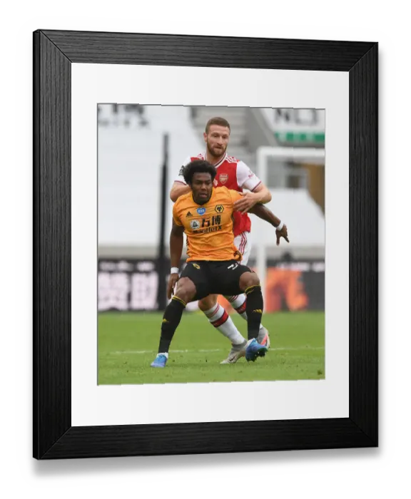 Framed Print : Mustafi vs Traore: Intense Clash Between Wolverhampton and Arsenal in Premier League (2019-20) Framed Print : Mustafi vs Traore: Intense Clash Between Wolverhampton and Arsenal in Premier League (2019-20)