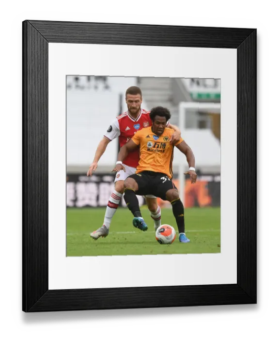 Framed Print : Mustafi vs Traore: Intense Battle at Molineux - Wolverhampton Wanderers vs Arsenal FC, Premier League 2019-2020