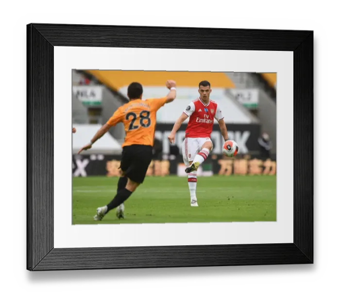 Framed Print : Granit Xhaka: Arsenal vs. Wolverhampton Wanderers, Premier League 2019-2020
