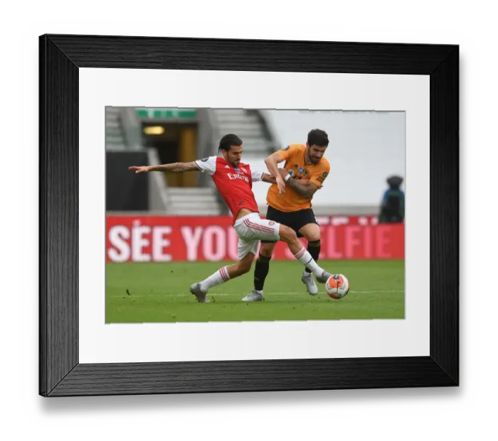 Framed Print : Dani Ceballos vs. Ruben Neves: Intense Clash Between Wolverhampton and Arsenal in Premier League Framed Print : Dani Ceballos vs. Ruben Neves: Intense Clash Between Wolverhampton and Arsenal in Premier League