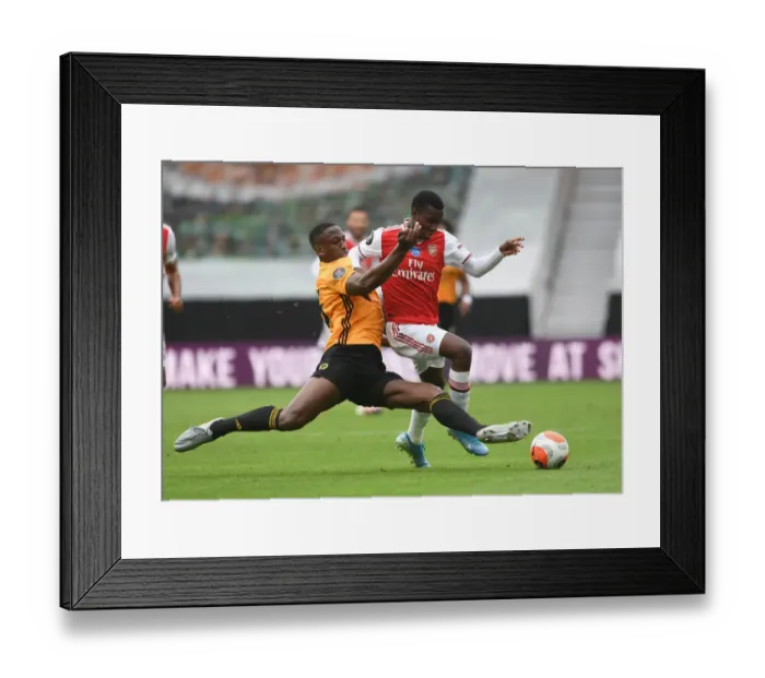 Framed Print : Wolverhampton Wanderers vs. Arsenal: Nketiah vs. Boly Battle in Premier League Clash