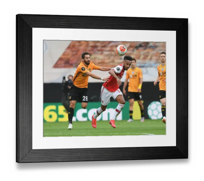 Framed Print : Aubameyang vs. Moutinho: Intense Clash Between Wolverhampton and Arsenal in Premier League