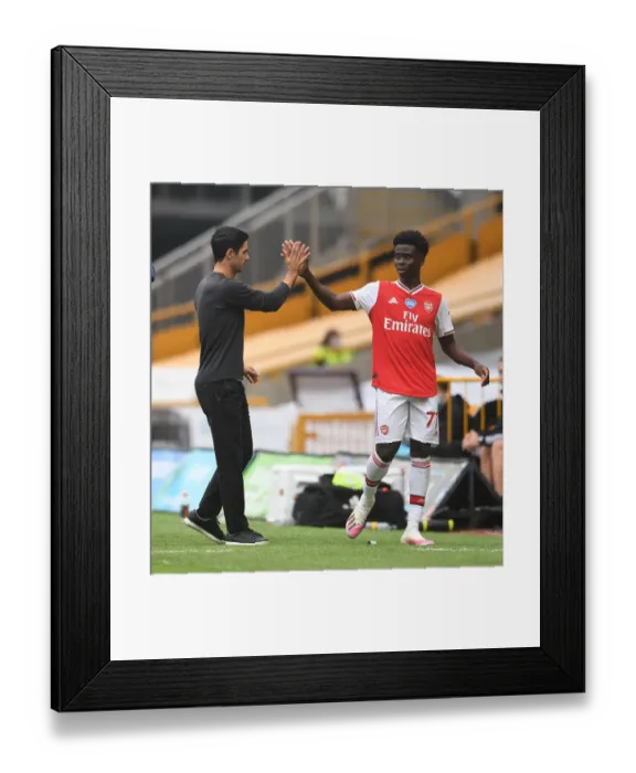 Framed Print : Mikel Arteta and Bukayo Saka: A High-Fiving Moment at Wolverhampton Wanderers vs Arsenal FC (Premier League 2019-20)