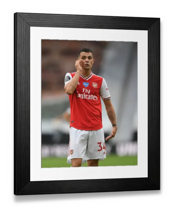 Framed Print : Granit Xhaka in Action: Wolverhampton Wanderers vs. Arsenal FC, Premier League 2019-2020