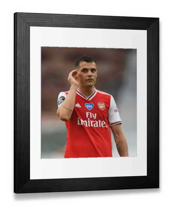 Framed Print : Granit Xhaka: Arsenal's Midfield Maestro Shines Against Wolverhampton Wanderers