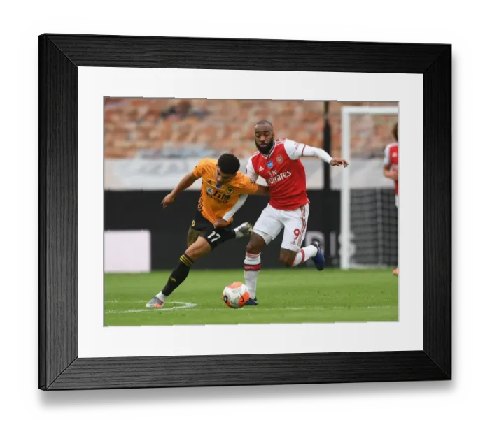 Framed Print : Lacazette vs Gibbs-White: A Battle in the Premier League Clash between Wolverhampton and Arsenal Framed Print : Lacazette vs Gibbs-White: A Battle in the Premier League Clash between Wolverhampton and Arsenal