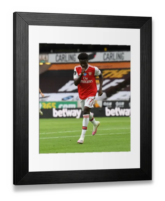 Framed Print : Saka Scores: Arsenal's Triumph at Wolverhampton Wanderers (2019-2020)